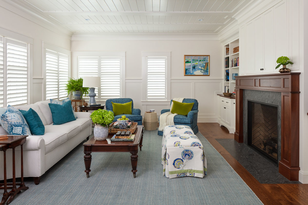 seating room with coffee table, sofa and fireplace