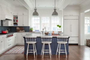 coastal kitchen with pendant lights, large island and counter stools