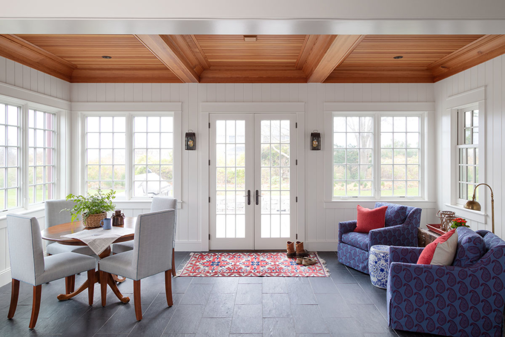 large sun room with original ceilings