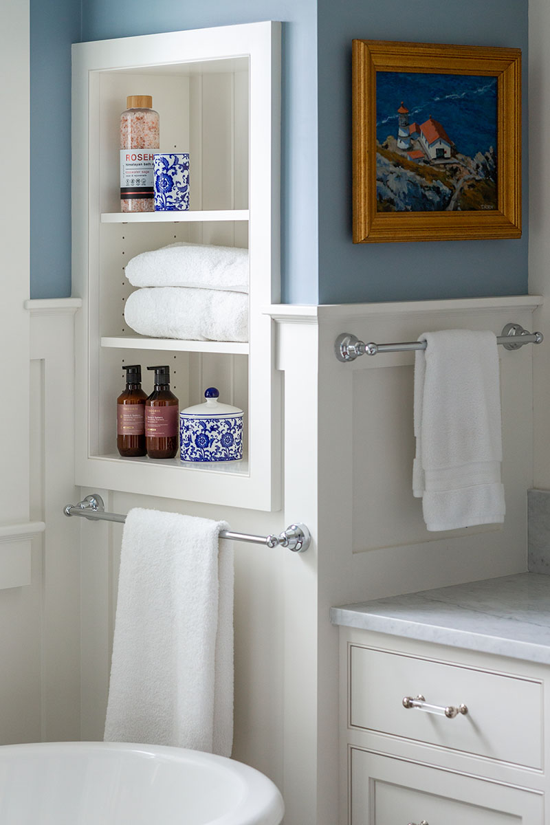 primary bathroom with built-in shelving
