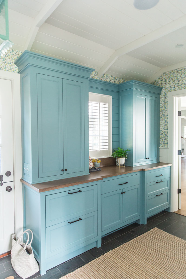 back entryway with painted storage area