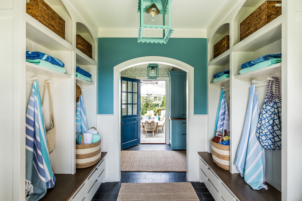 summer mudroom with large built-in shelving