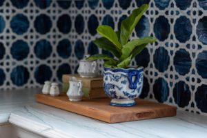 kitchen counter and backsplash with cutting board