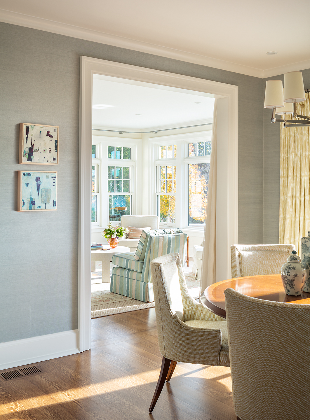 dining chairs and table opening to living room