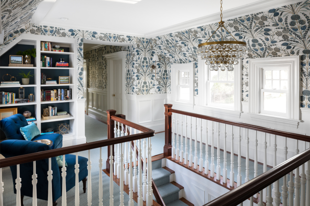 stairway and landing area with full wallpaper