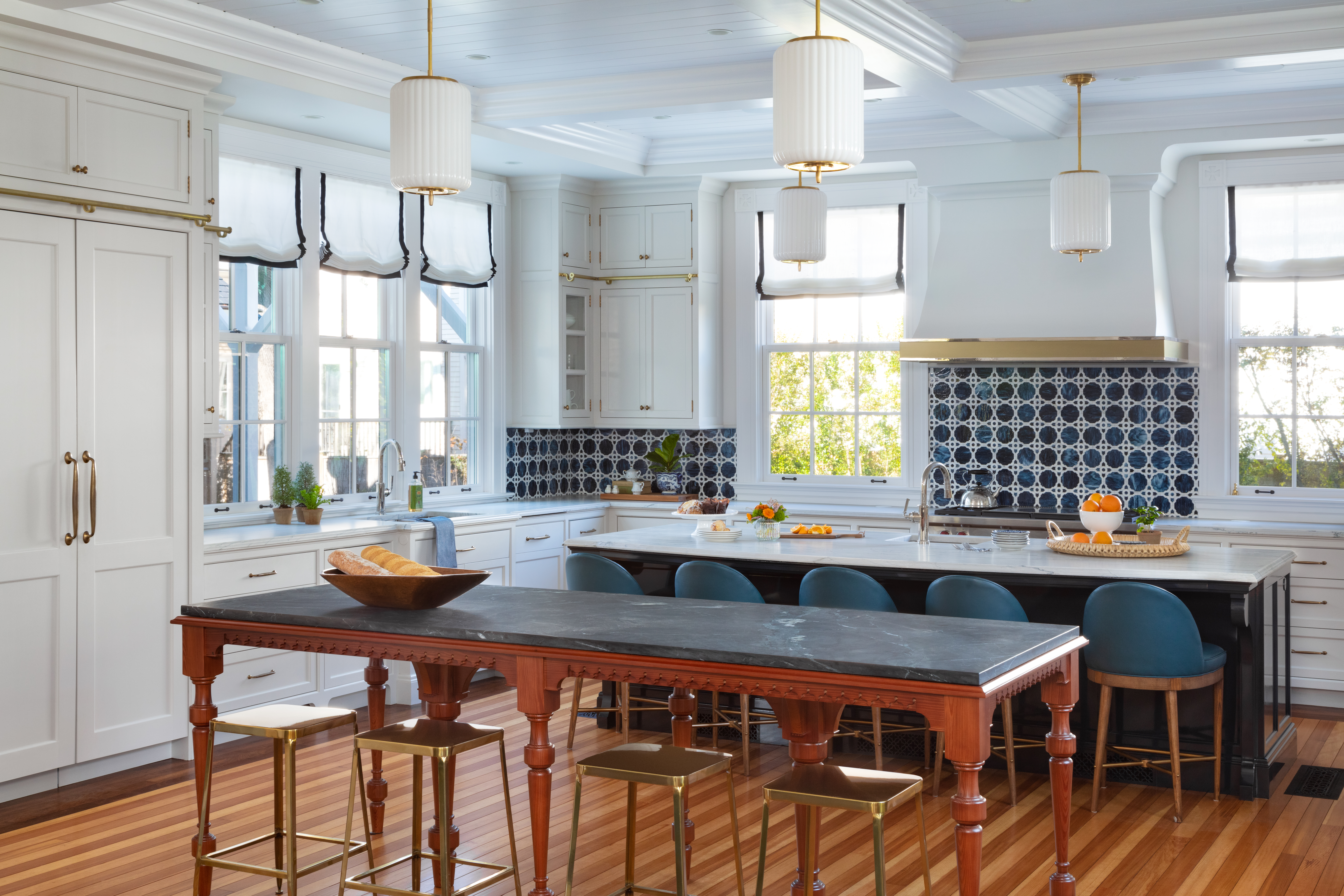 large, open-concept kitchen with two islands