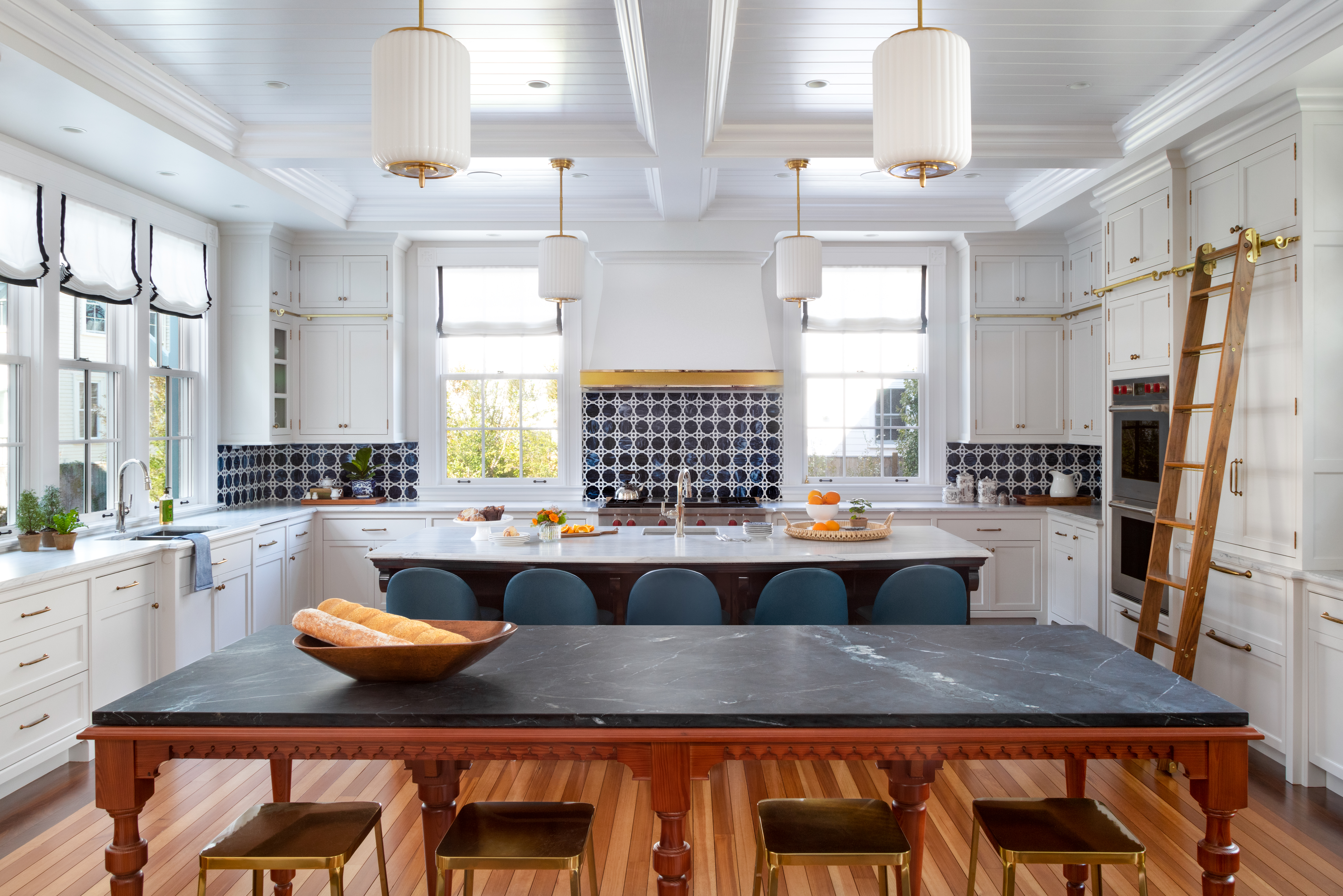 large, open-concept kitchen with two islands