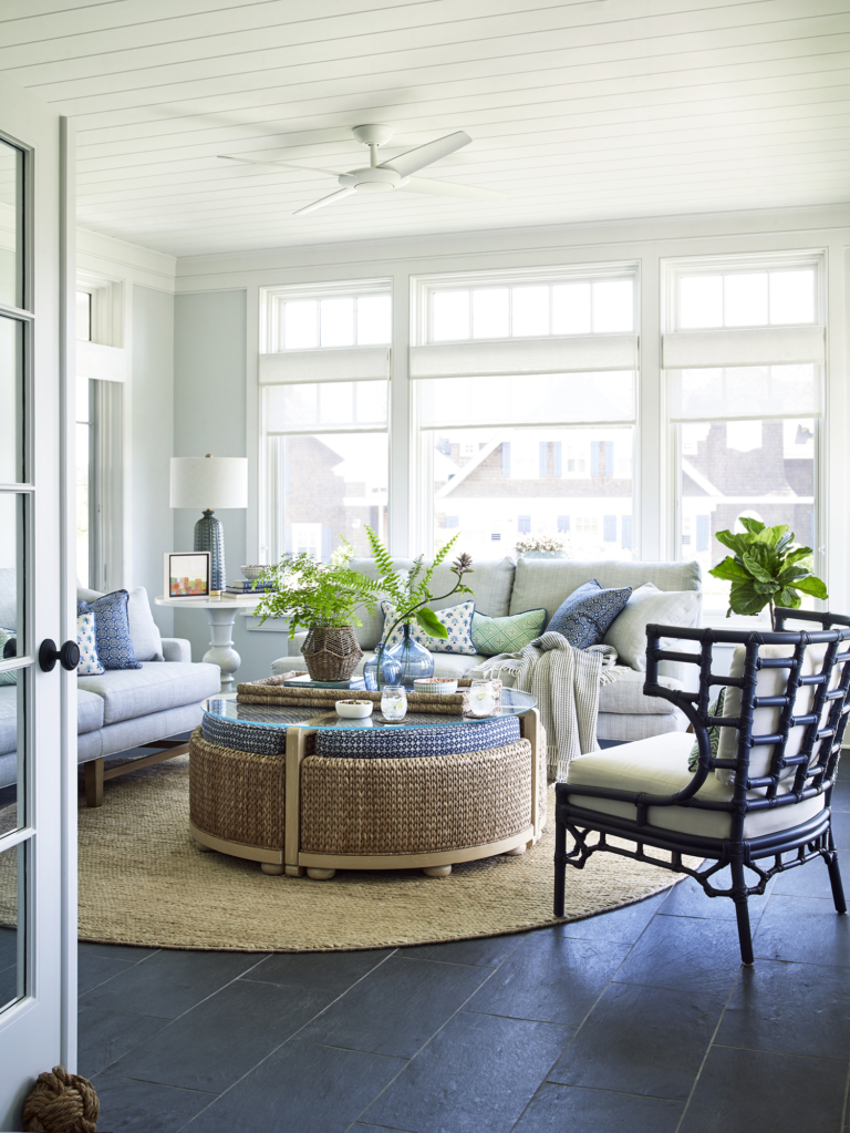 sun room with large seating area and ottoman