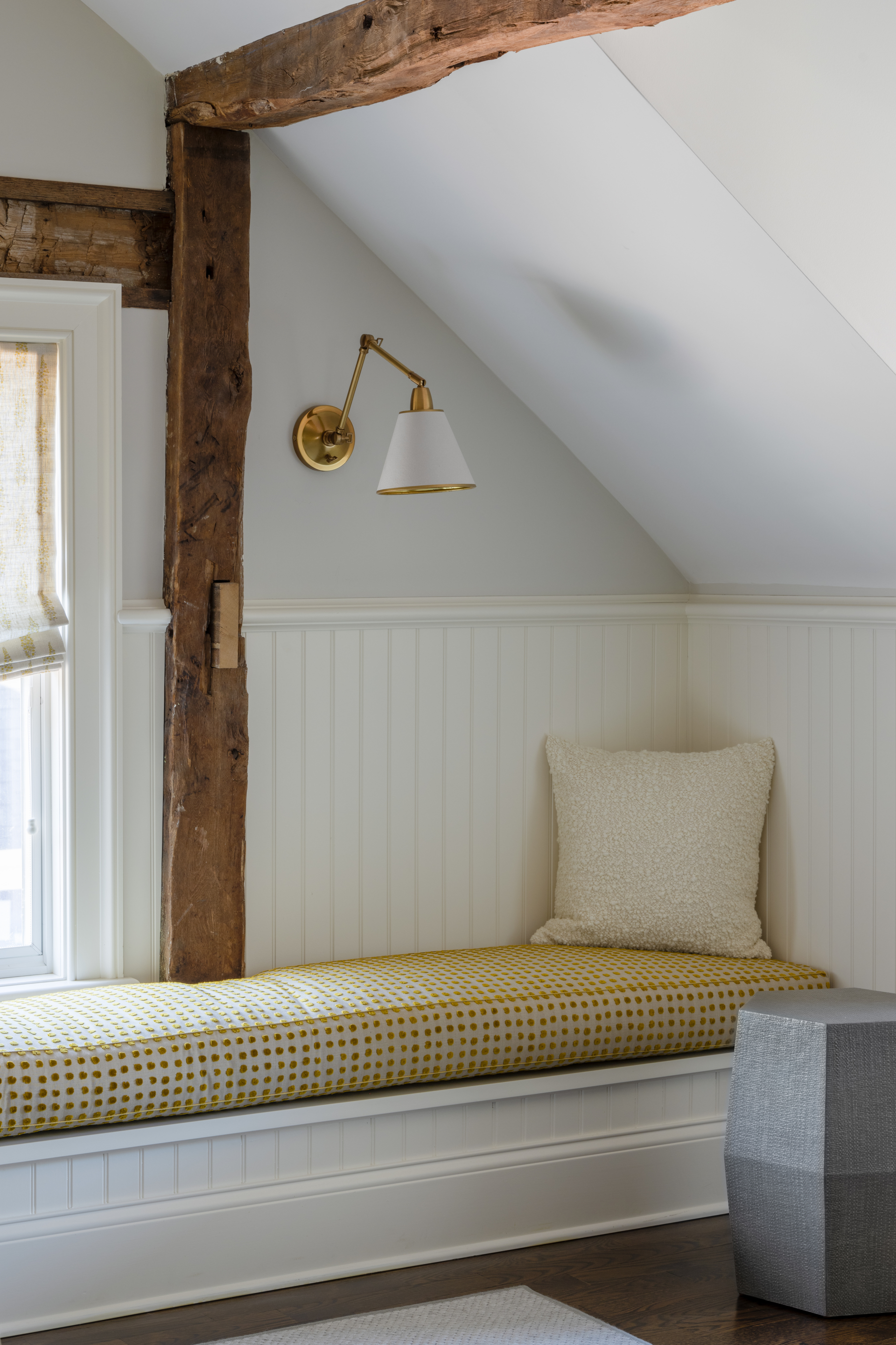 interior design project in Ridgefield CT, window seat in sun room with exposed beams
