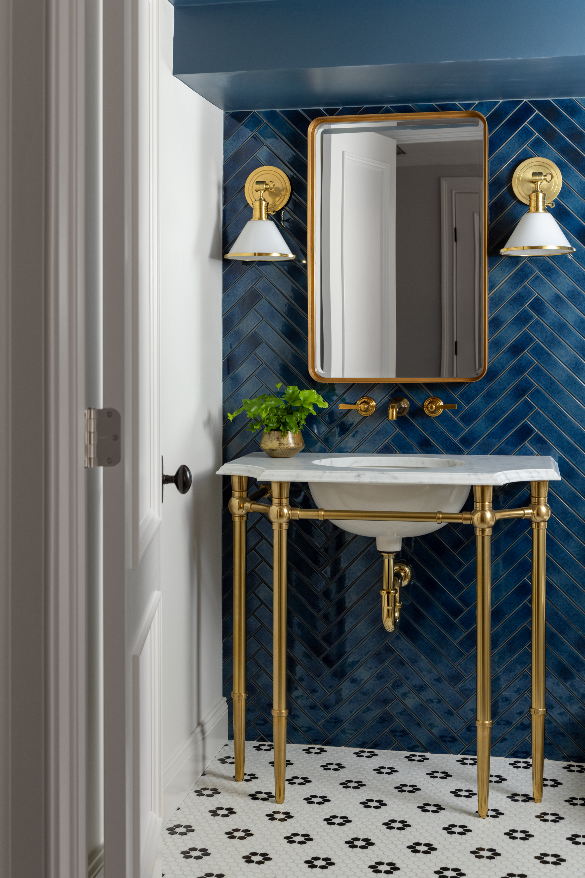 interior design project in Ridgefield CT, powder room with tiled wall and floor