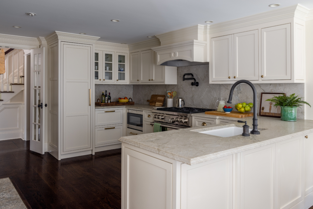 interior design project in Ridgefield CT, kitchen with white cabinets and stone backsplash