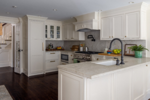 interior design project in Ridgefield CT, kitchen with white cabinets and stone backsplash