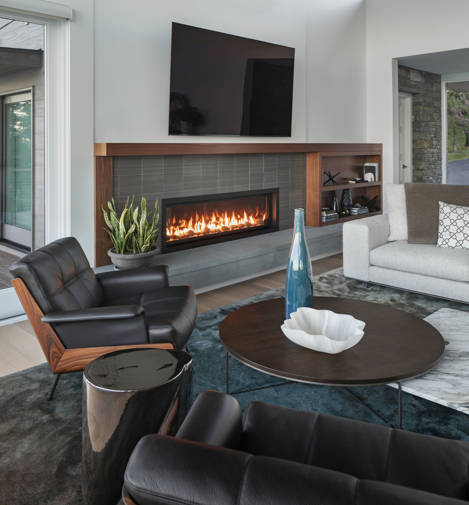 living room with modern furnishings and fire place