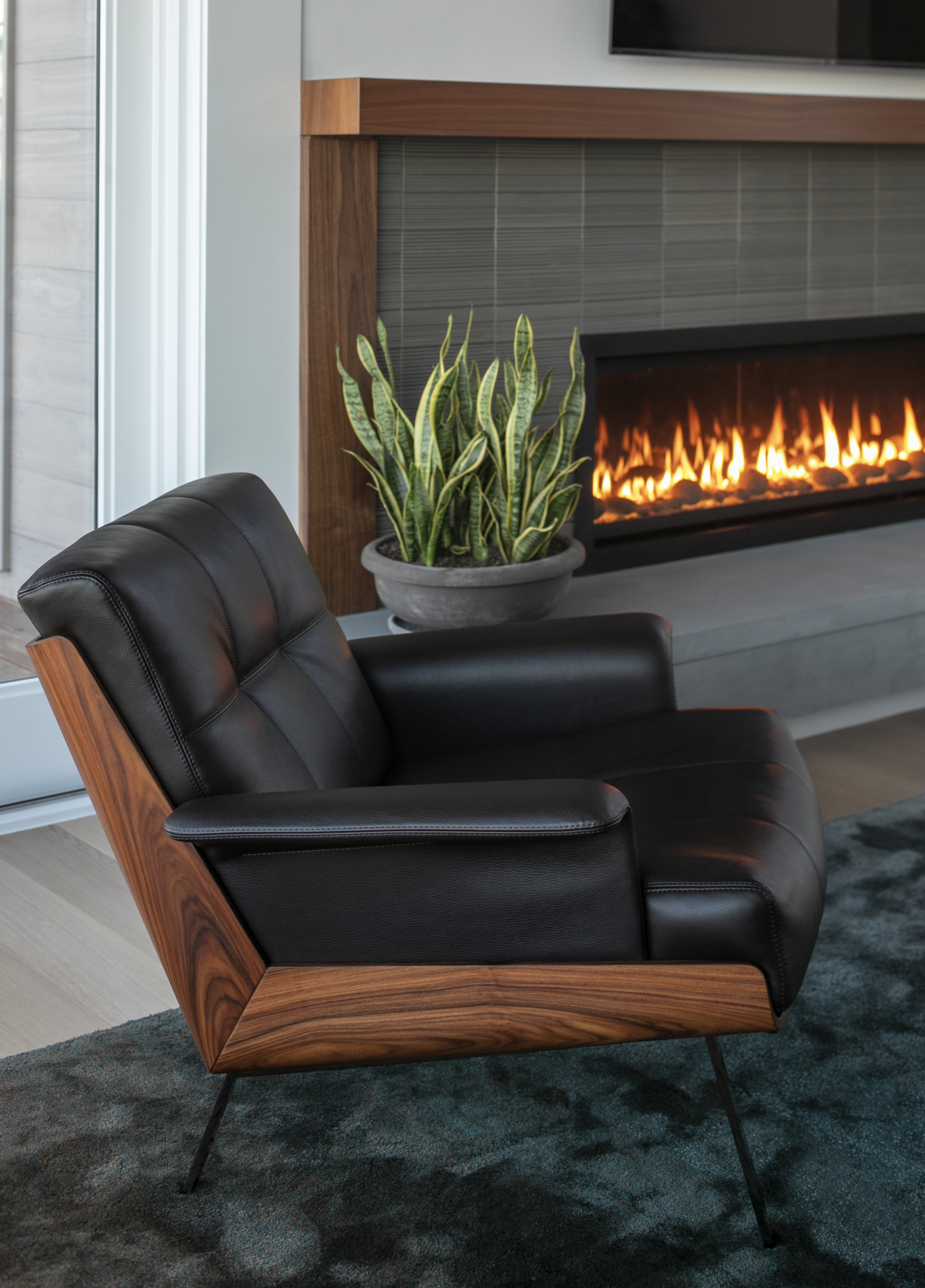 living room with modern furnishings and fire place
