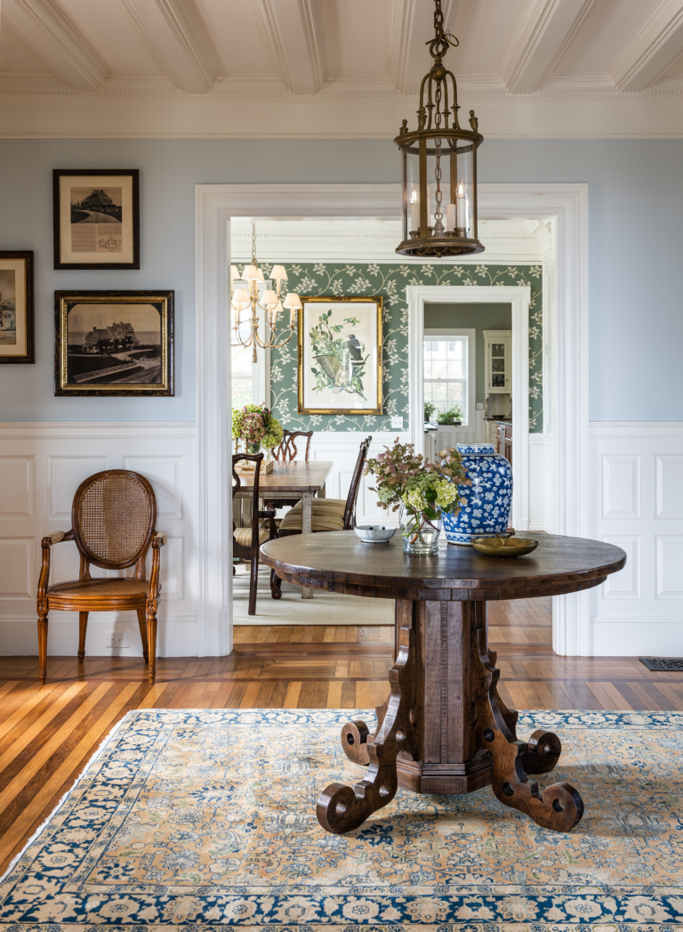 Table in foyer with antique rug