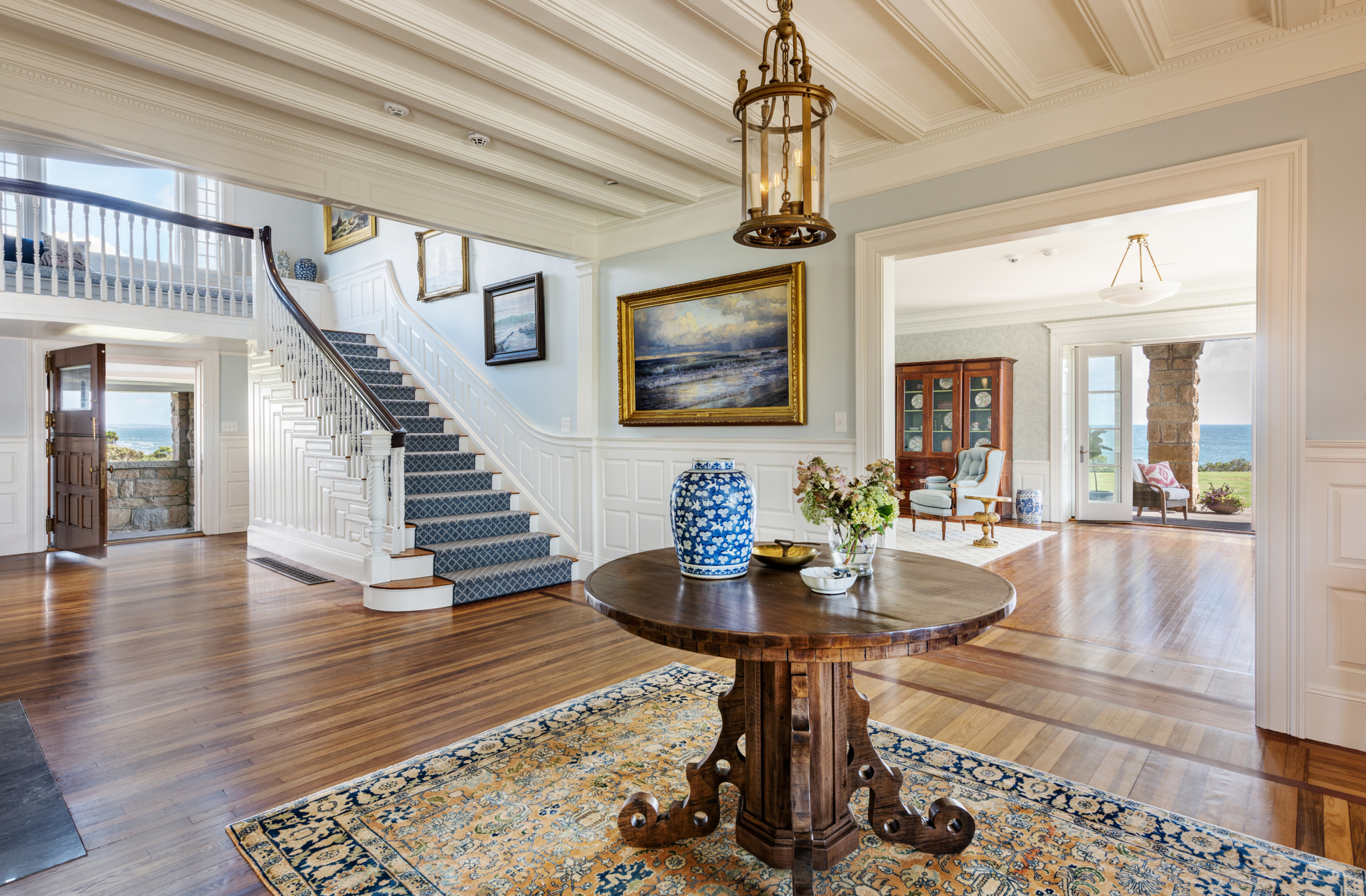 Foyer leading to seating area and stairway