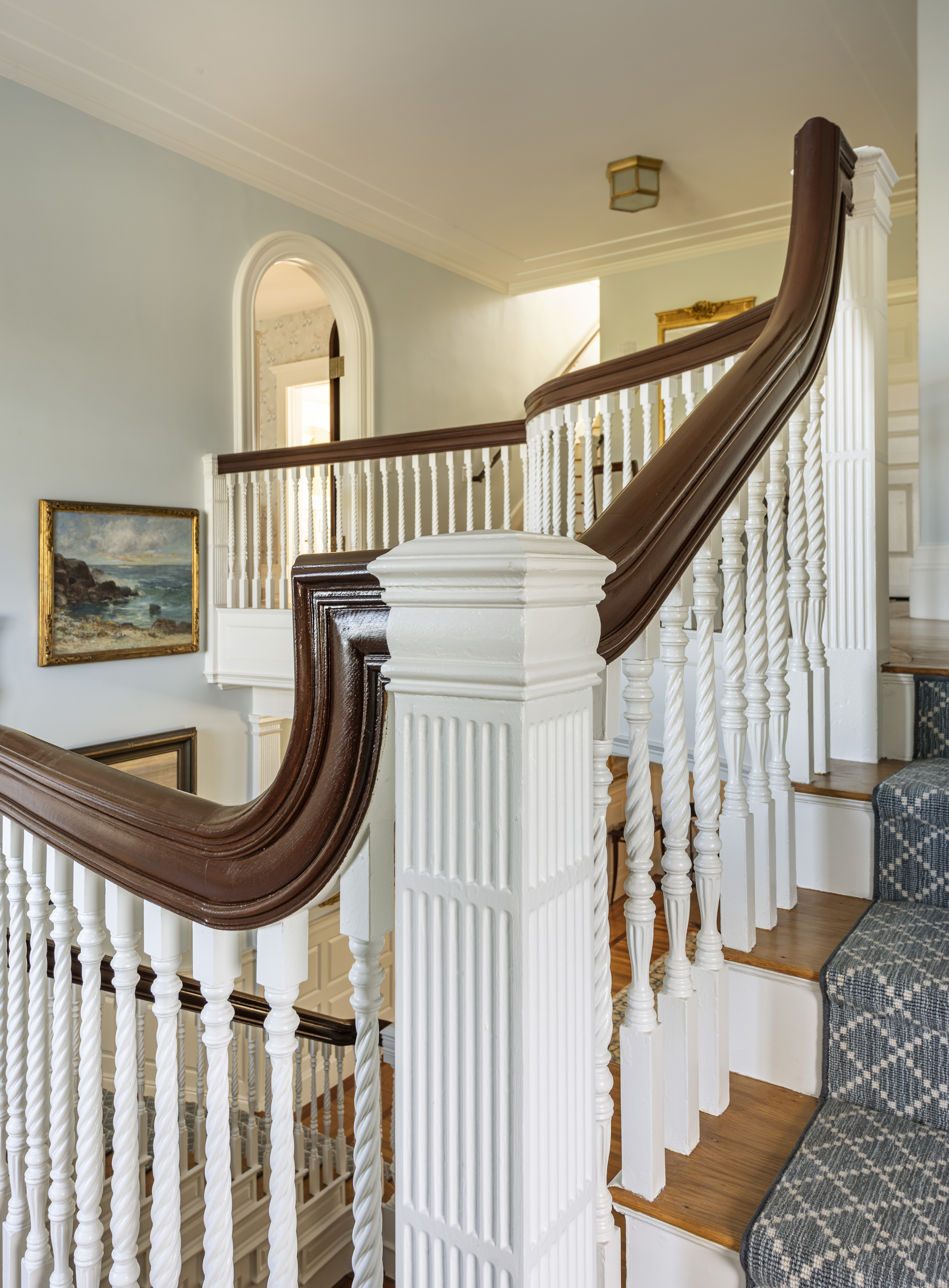 Stairway with banister and newel post