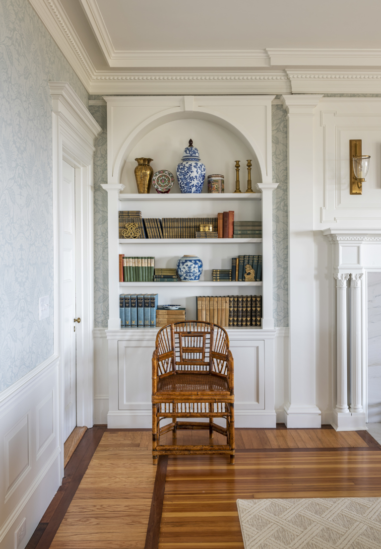 Living Room with built-ins and chair by fireplace