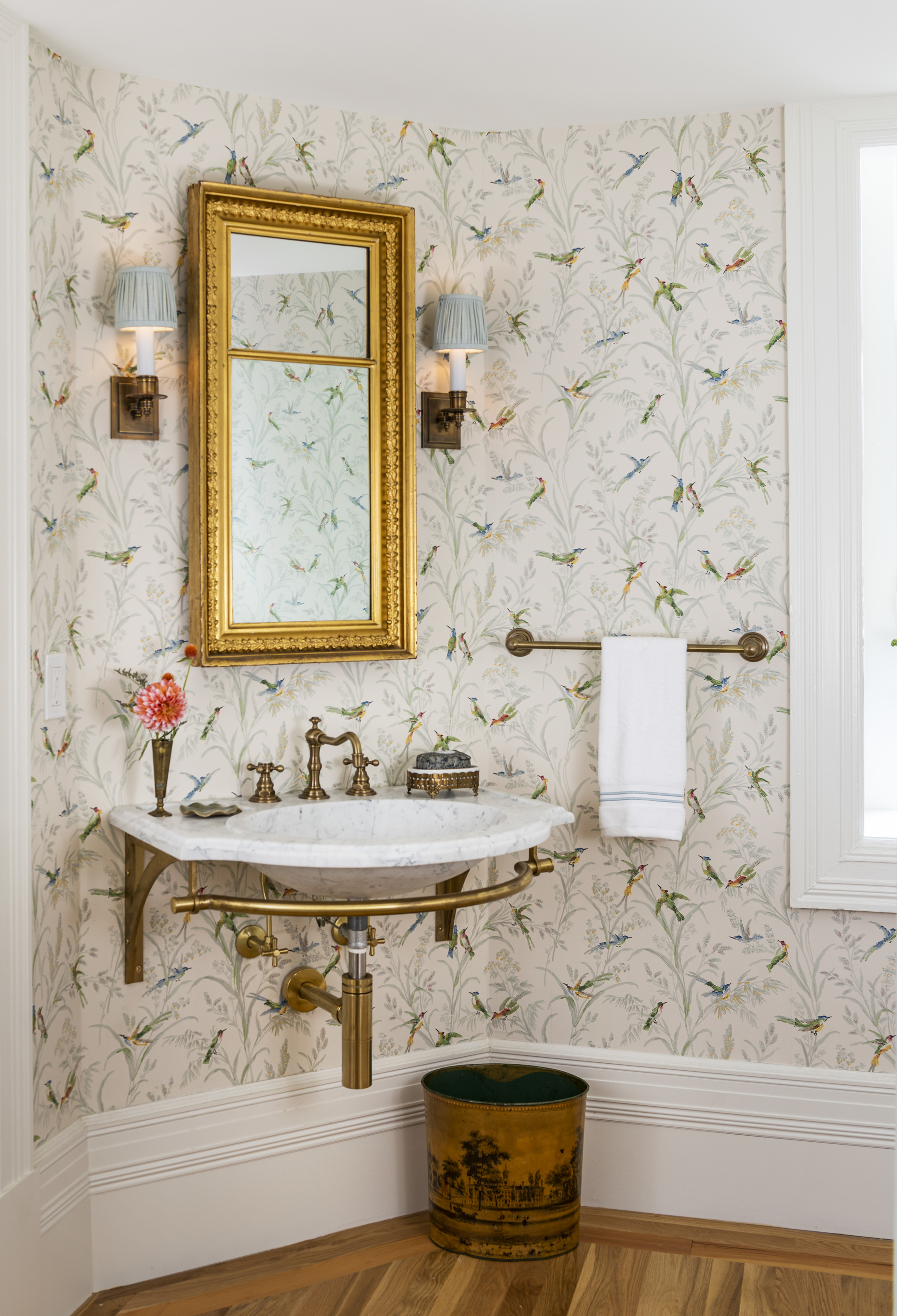 Powder room with wallpaper
