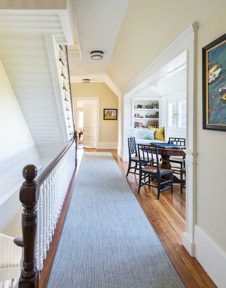 Hallway with a game table and built-ins