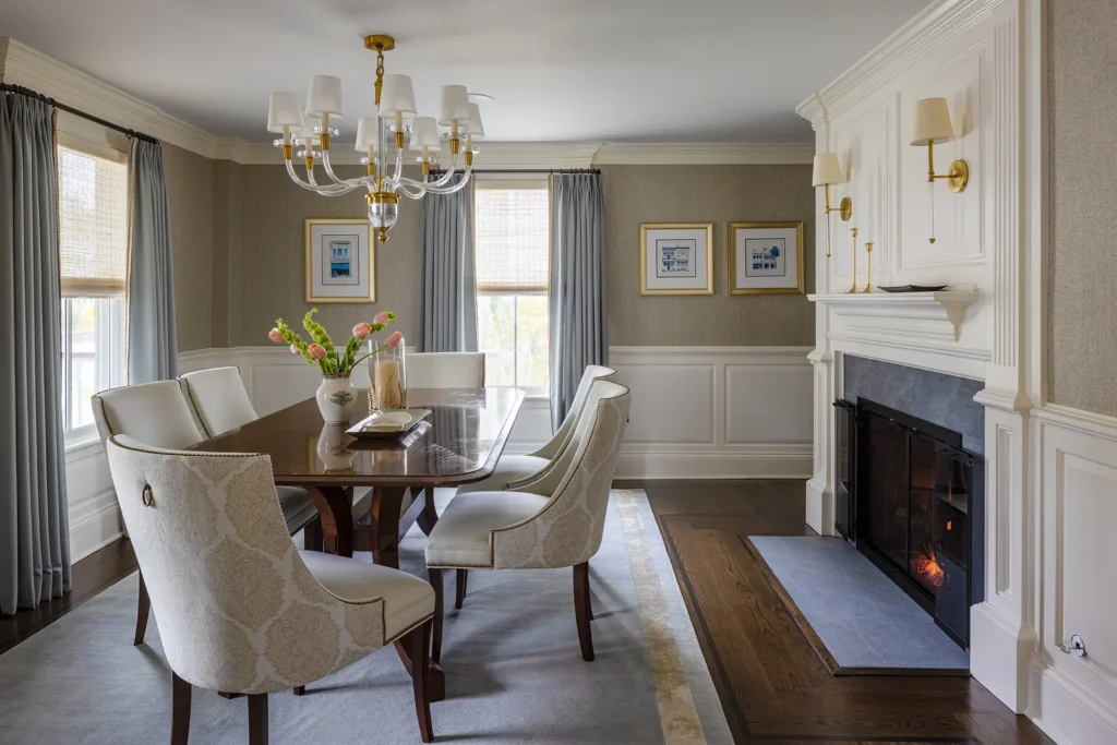Interior design project in Ridgefield CT, dining room with fireplace and chandelier.