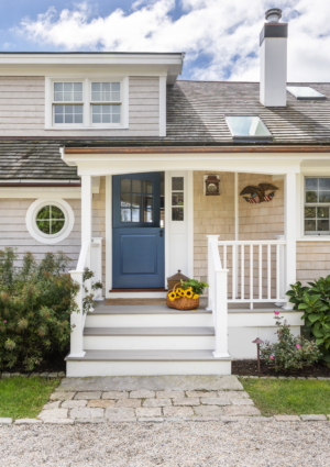 Blue front door for a New England summer beach house