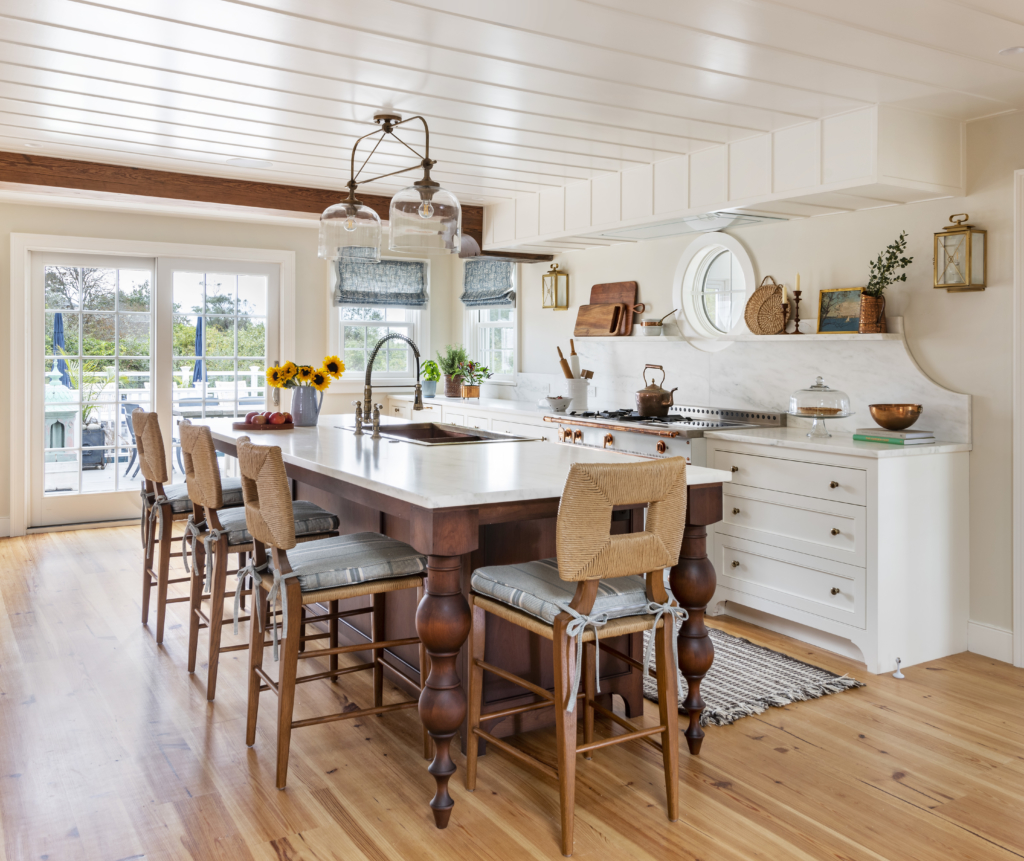 Interior design of a modern cottage with marble counters and copper accents. Little Compton, RI.