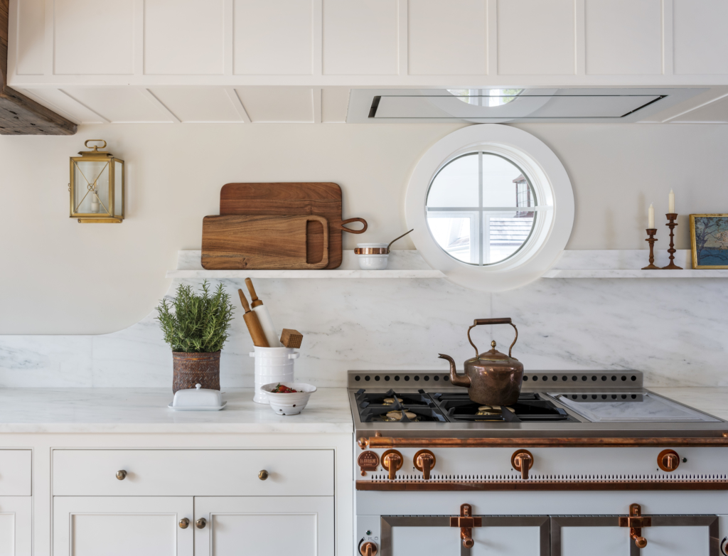 Interior design of a modern cottage with marble counters and copper accents. Little Compton, RI.