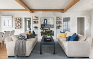 Living room with white sofas and fireplace