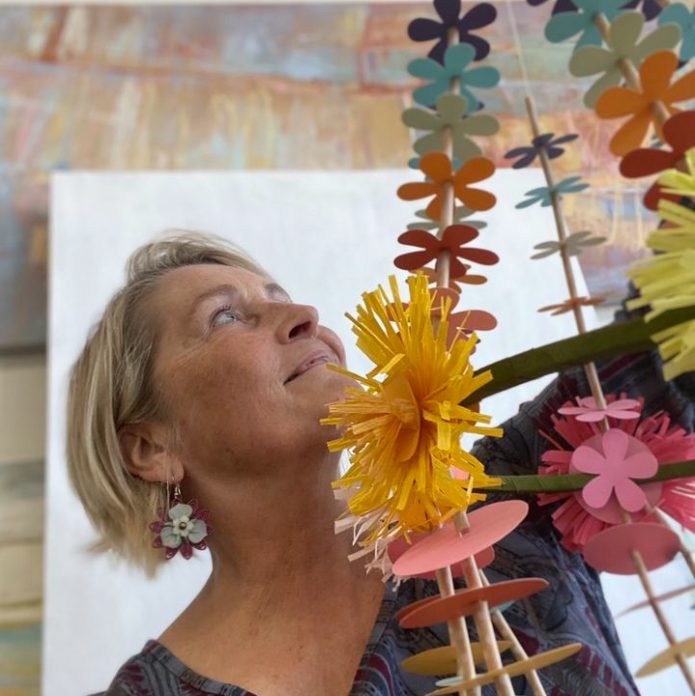 Alyn Carlson with paper flower chandelier