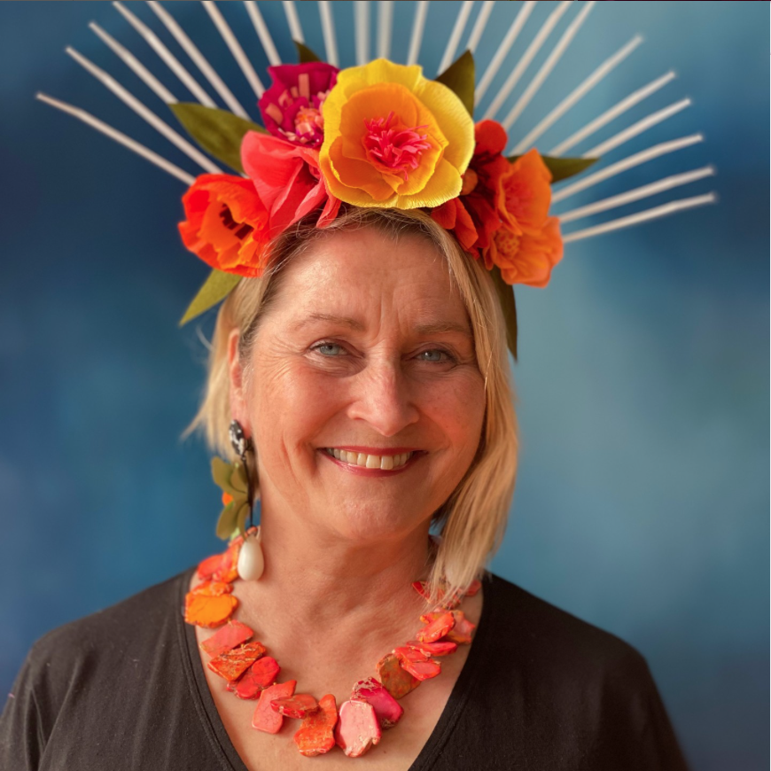 Alyn Carlson wearing a paper flower crown of her own creation