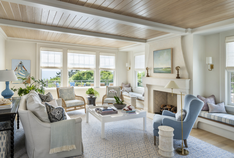 A blue and white living room designed by Taste Design in a modern coastal Paul Weber home near Newport RI