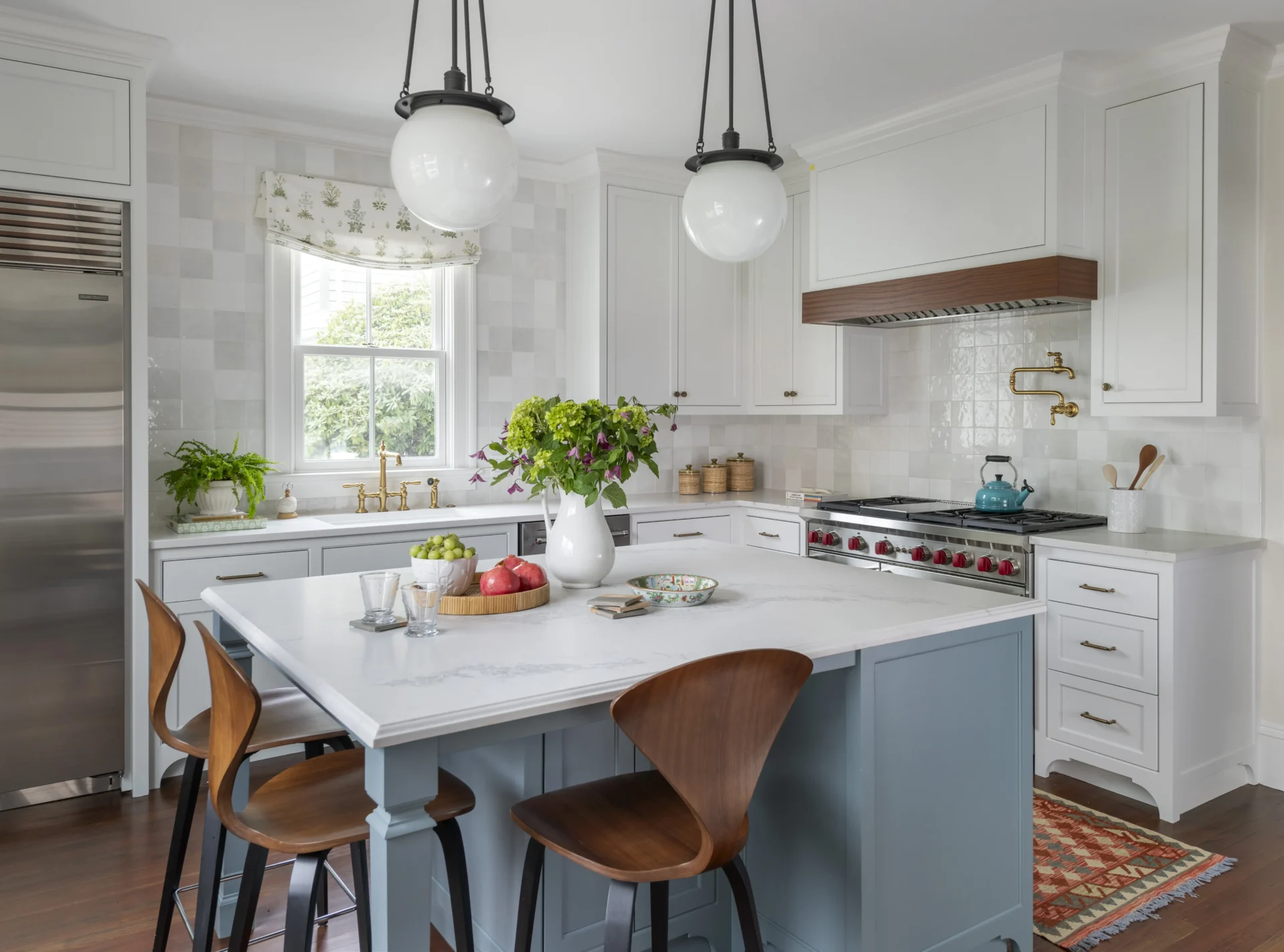 Kitchen renovation by Taste Design walnut accents and midcentury touches