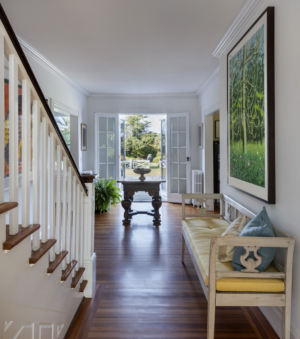 The foyer and staircase of a summer cottage in Rhode Island