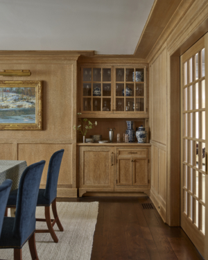 A dining room built in with oak paneling