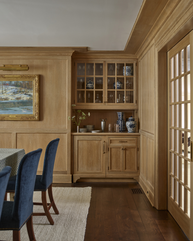 A dining room built in with oak paneling