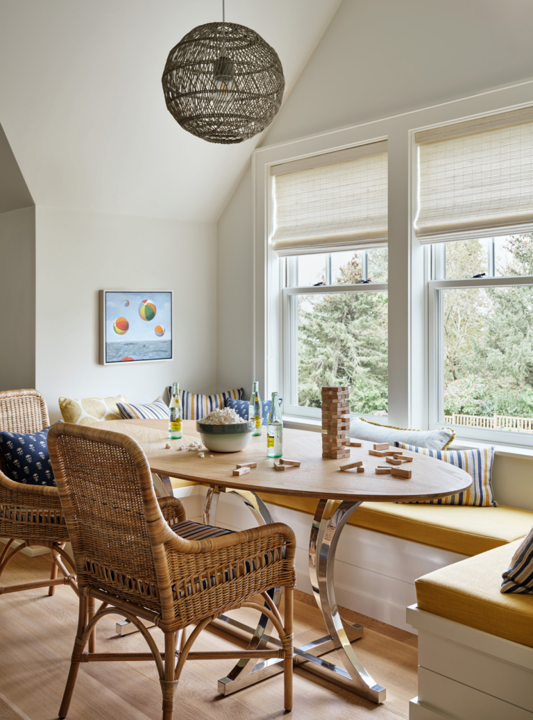A transitional style game room with banquet seating.