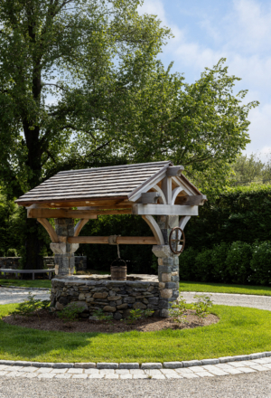 A restored historic stone well at a farmhouse in Rhode Island